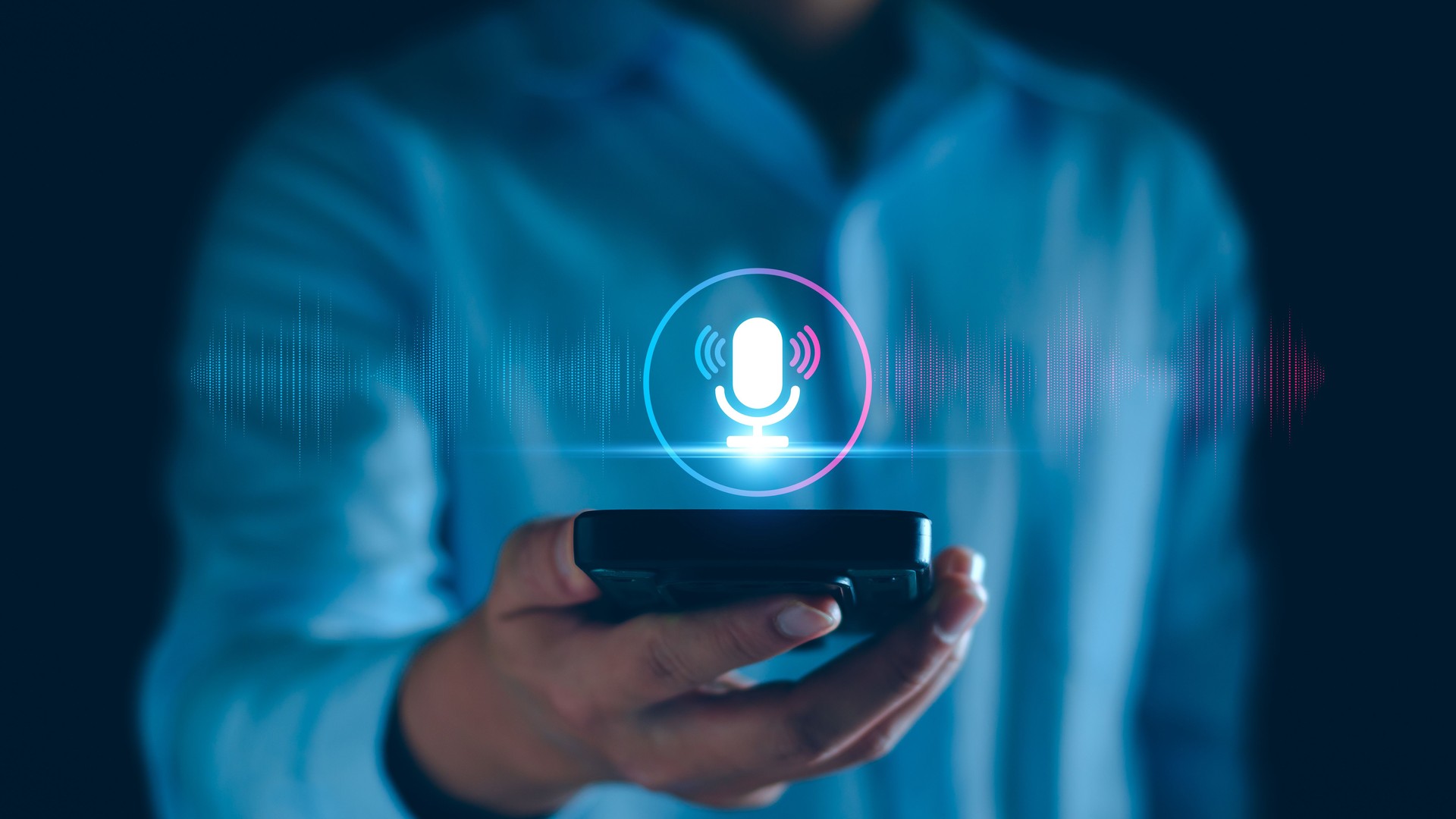 Voice recording. Man touching microphone icon on smart phone. Mobile application Record sound, audio, music, voice message. or Use your voice to direct AI to search for information on Internet.